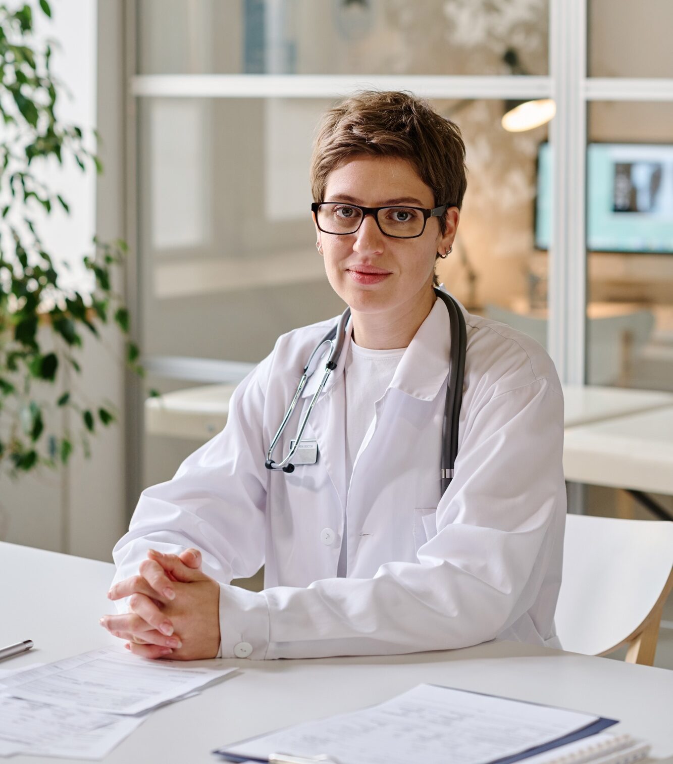 Female doctor sitting at her workplace